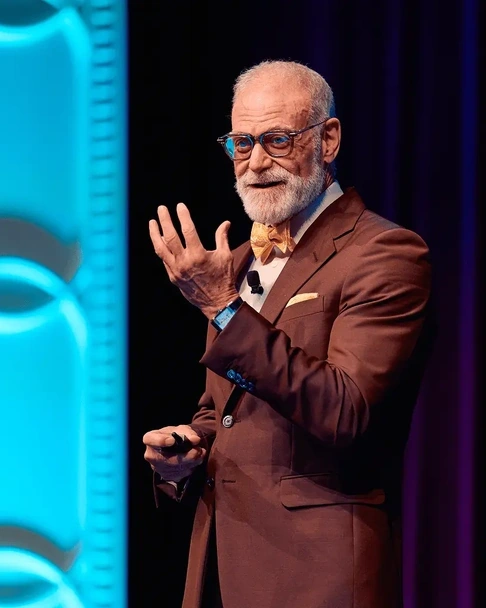 William Seeds, MD, speaking on stage